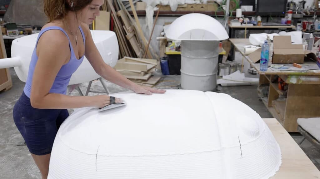 Sanding the foam sculpture