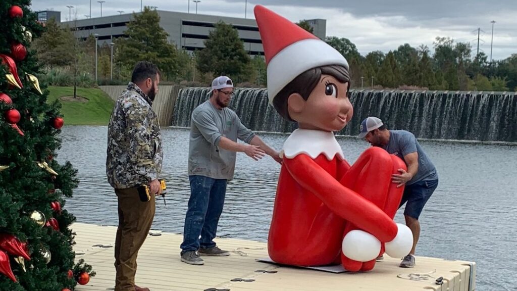 Smash Design installs a giant Elf on a Shelf experiential marketing sculpture